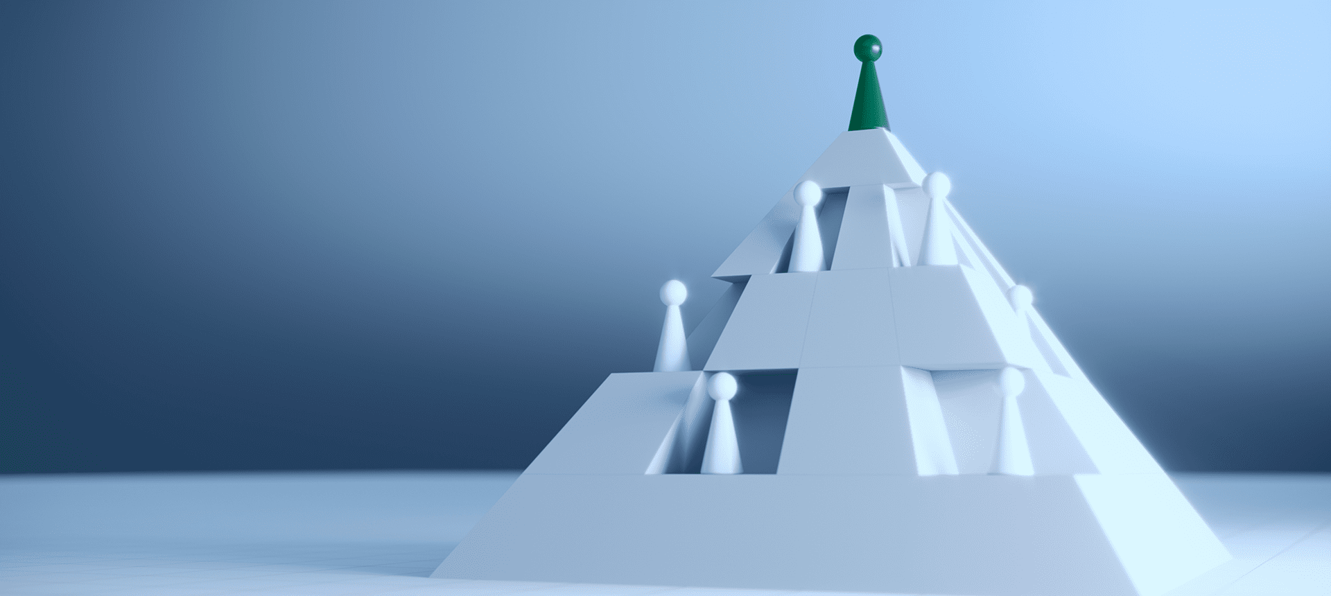 Pyramid structure with figures and green top.